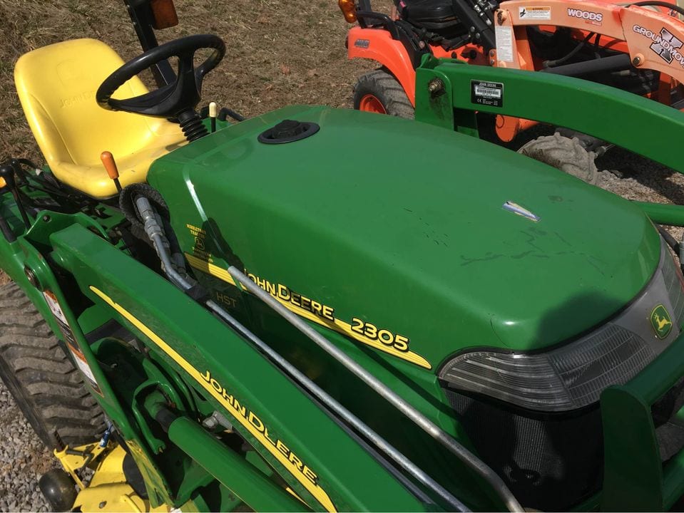 John Deere 2305 with front loader and 54 inch mid mower PreOwned Kubota